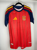 Camiseta oficial de España Local My Store 3 roja con detalles en azul y amarillo, escudo con holograma y Climacool.